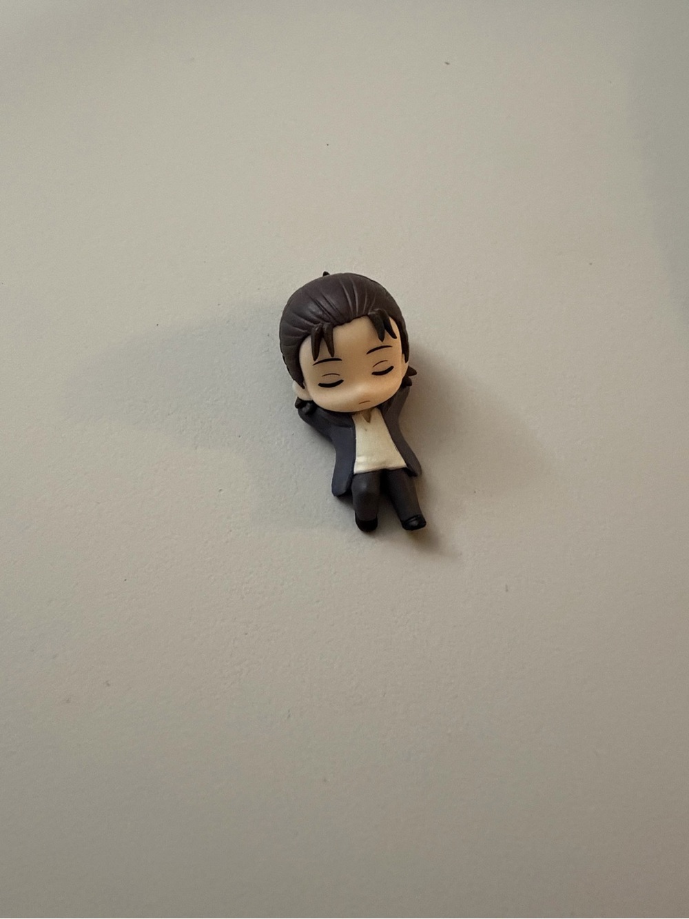 Mini Eren Jaegar sleeping figurine